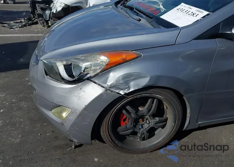 2013 Hyundai Elantra Gls z USA, uszkodzony, nr VIN KMHDH4AE7DU748508